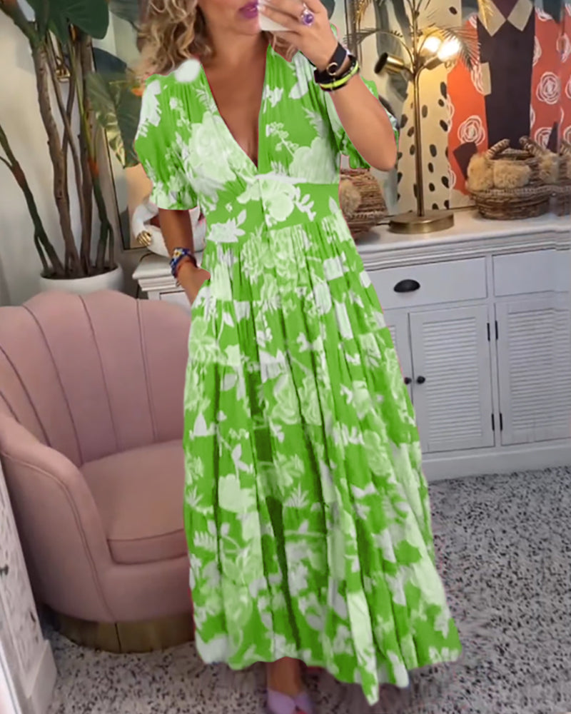 Catrisa™ | Bloemenpatroon maxi jurk met zakken